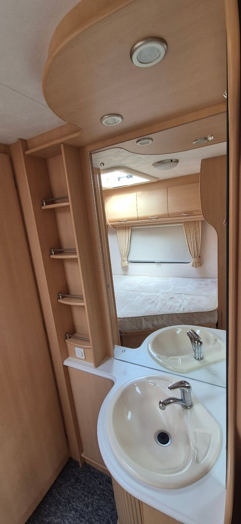 4 berth caravan fixed bed with motor mover 