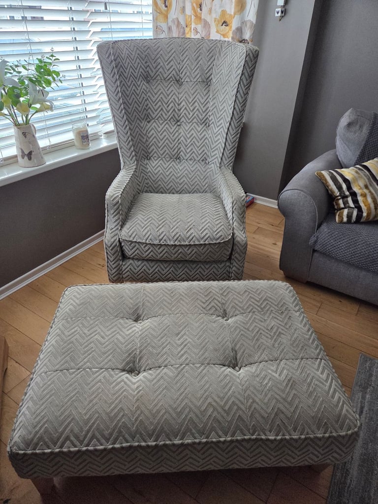 Armchair with maching footstool.  Come with 2 matching cushions 