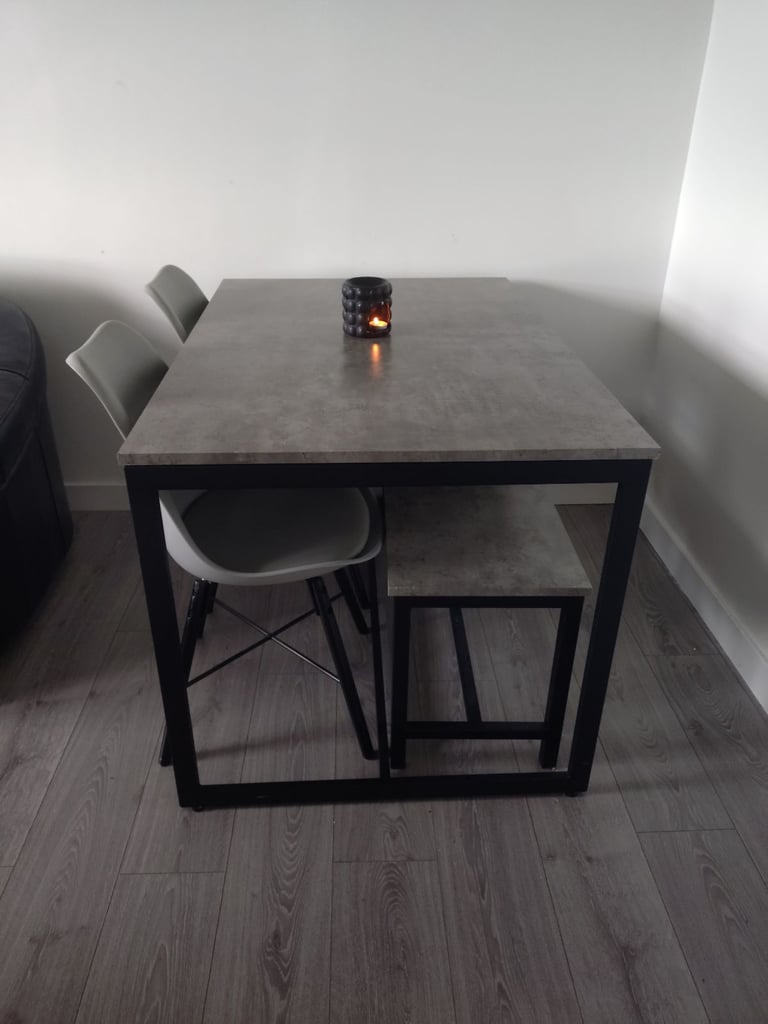 Dining table 2 chairs and a bench grey concrete affect