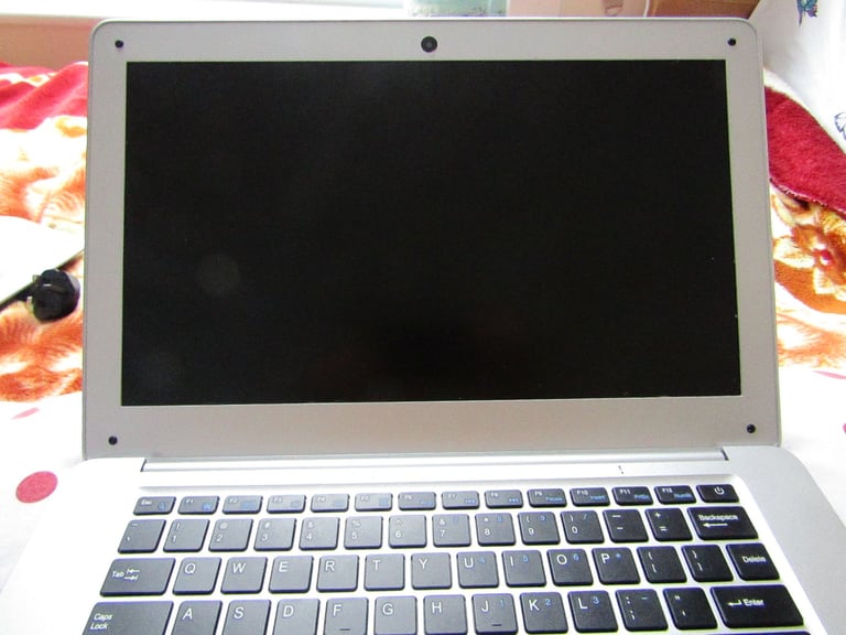 silver JOOMPER 14inch laptop tools in good condition lightly used 64GB own charger