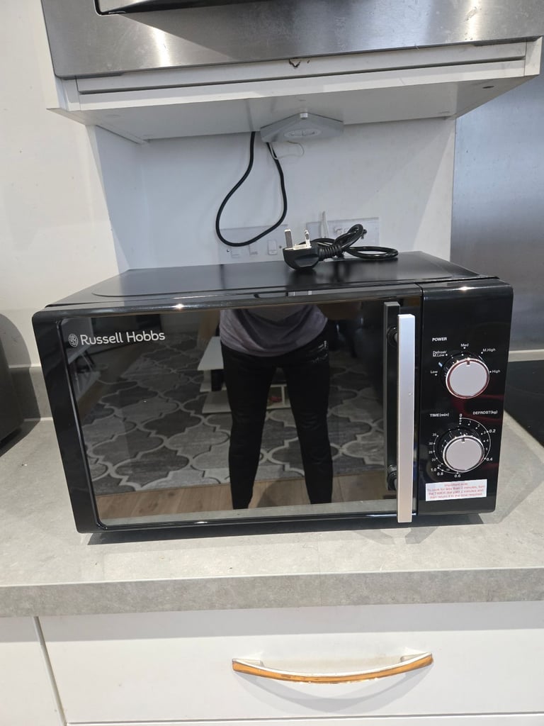 image for Brand new russell hobbs (rhm2060b) microwave with a small dent on the side (working perfectly)