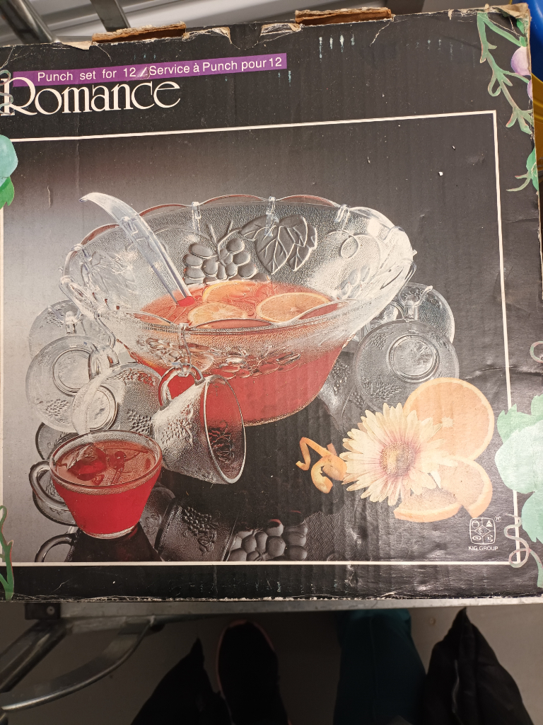 Vintage Romance 12 Cup Glass Punch Bowl Set. The ad is up so this item is still available