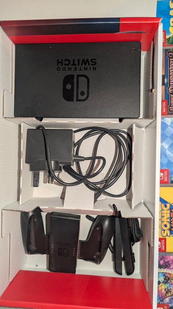 Nintendo switch bundle, boxed  with 9 games