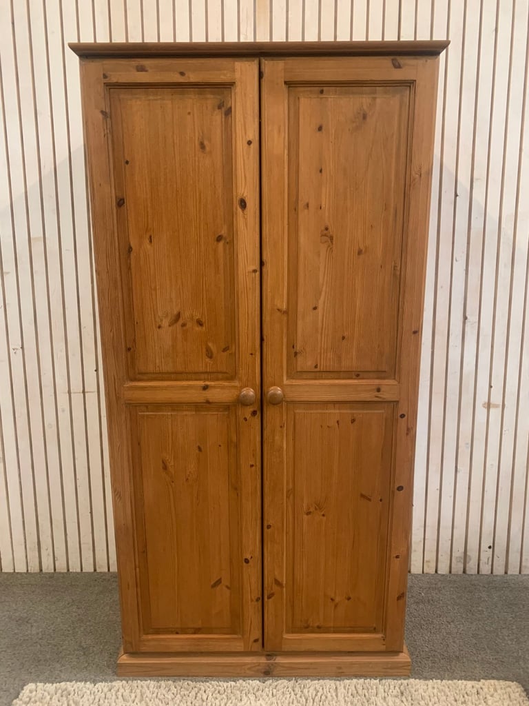 image for Pine wardrobe with two doors and two hanging rails.
