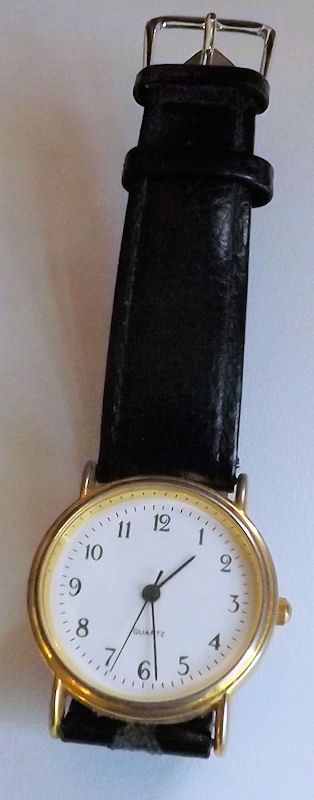 UNISEX QUARTZ WATCH WITH GOOD QUALITY BLACK LEATHER STRAP. G.W.O.