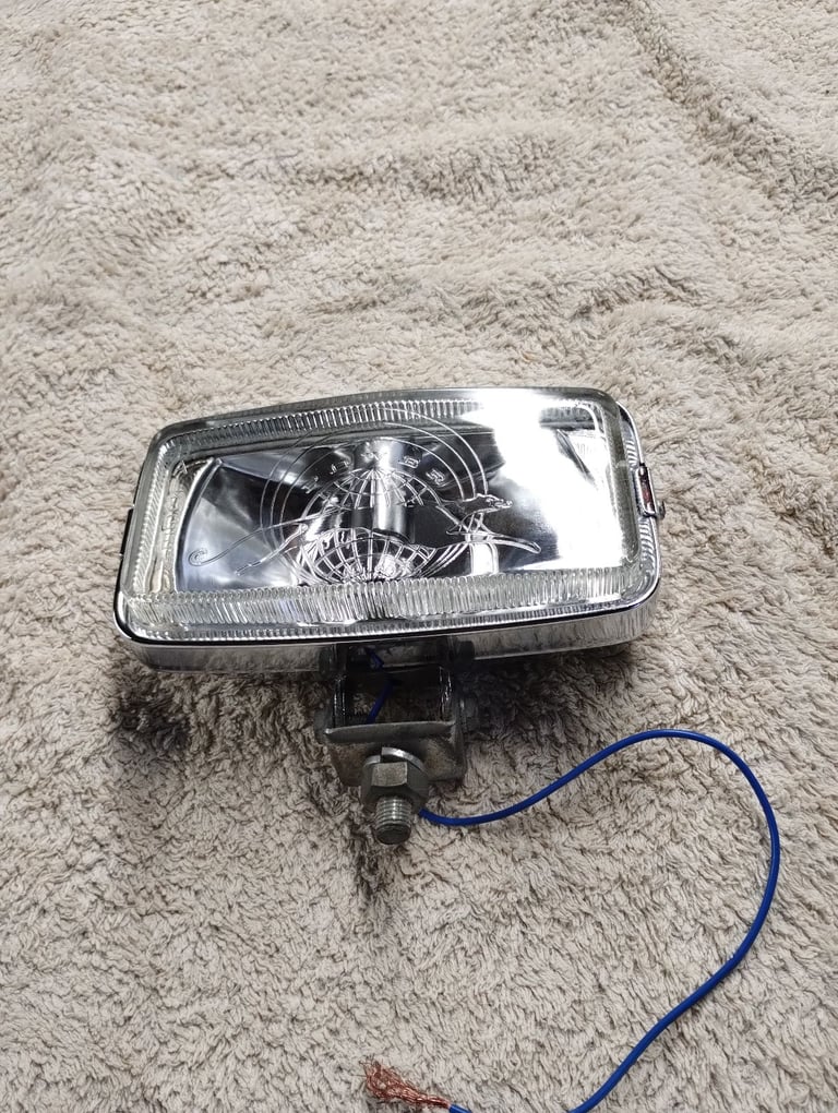 Classic car driving lamp Panther power logo on glass nice.