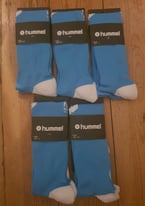 For sale is a 5 pairs of Hummel football socks.