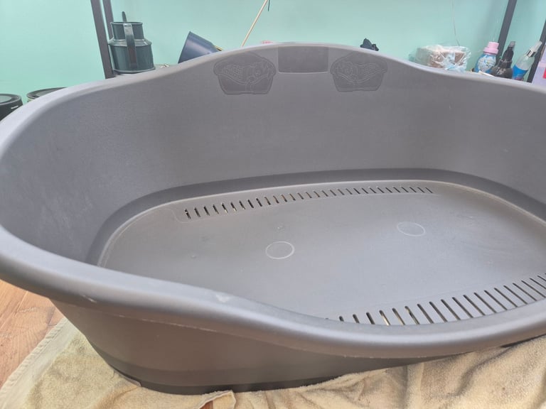 Large plastic dog bed