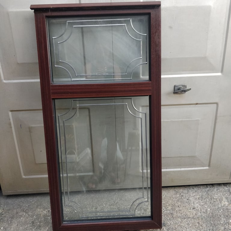 BROWN UPVC DOUBLE GLAZED WINDOW WITH LEAD BORDER