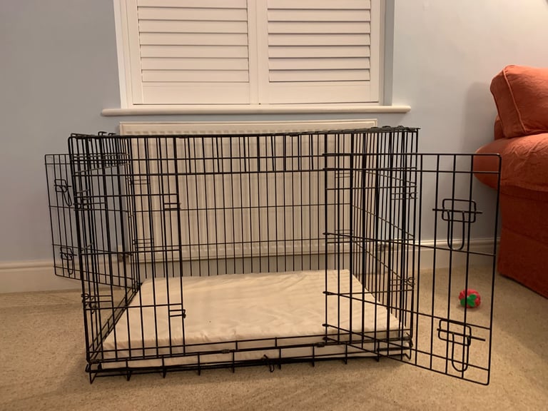Large dog crate with mattress