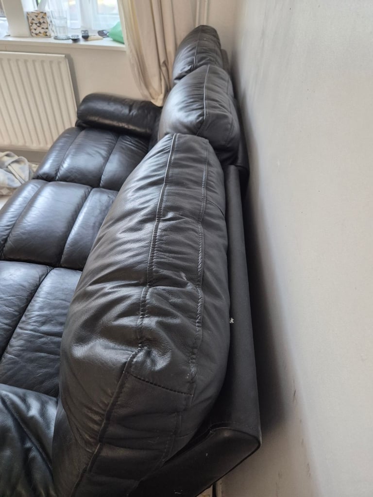 Black leather reclining 3 seater sofa 