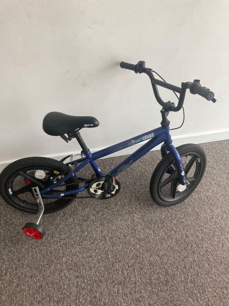 kids bike and two scooters 