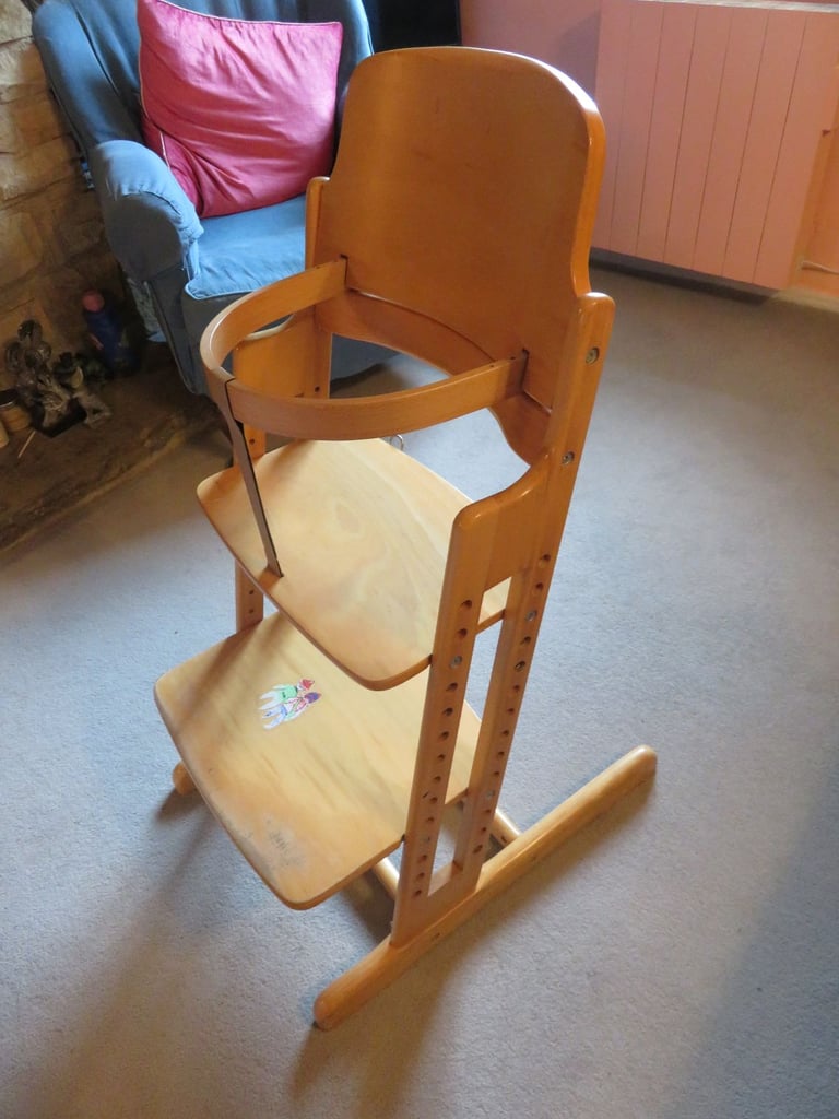 Wooden high chair. Good quality and very adjustable. Dan Chair, similar to Tripp Trapp