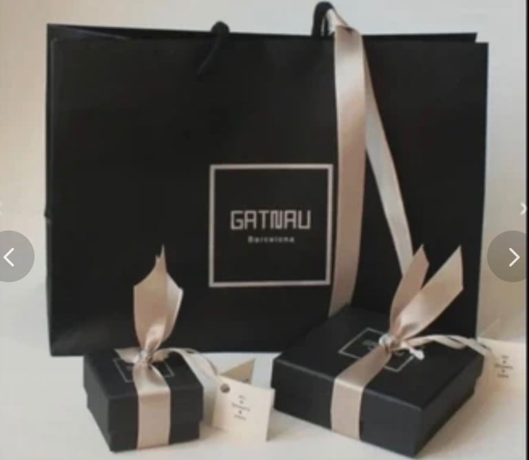 Gatnau solid silver handmade earring , new in box