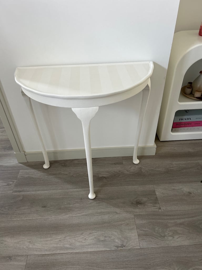 Elegant refinished hall table with ghost stripes