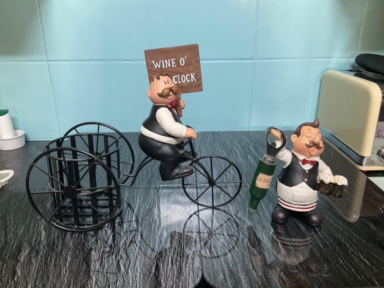 Bottle holder and opener.