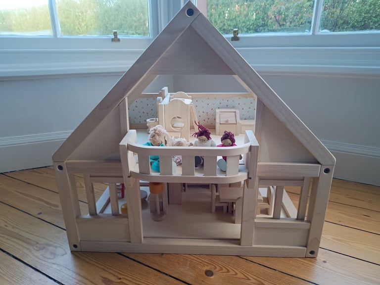 Plan toys wooden dolls house complete with furniture set and dolls, like new condition £120 ono