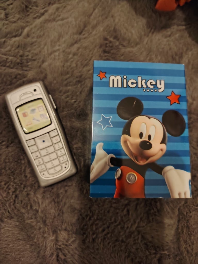 Toy phone and Disney nightlight