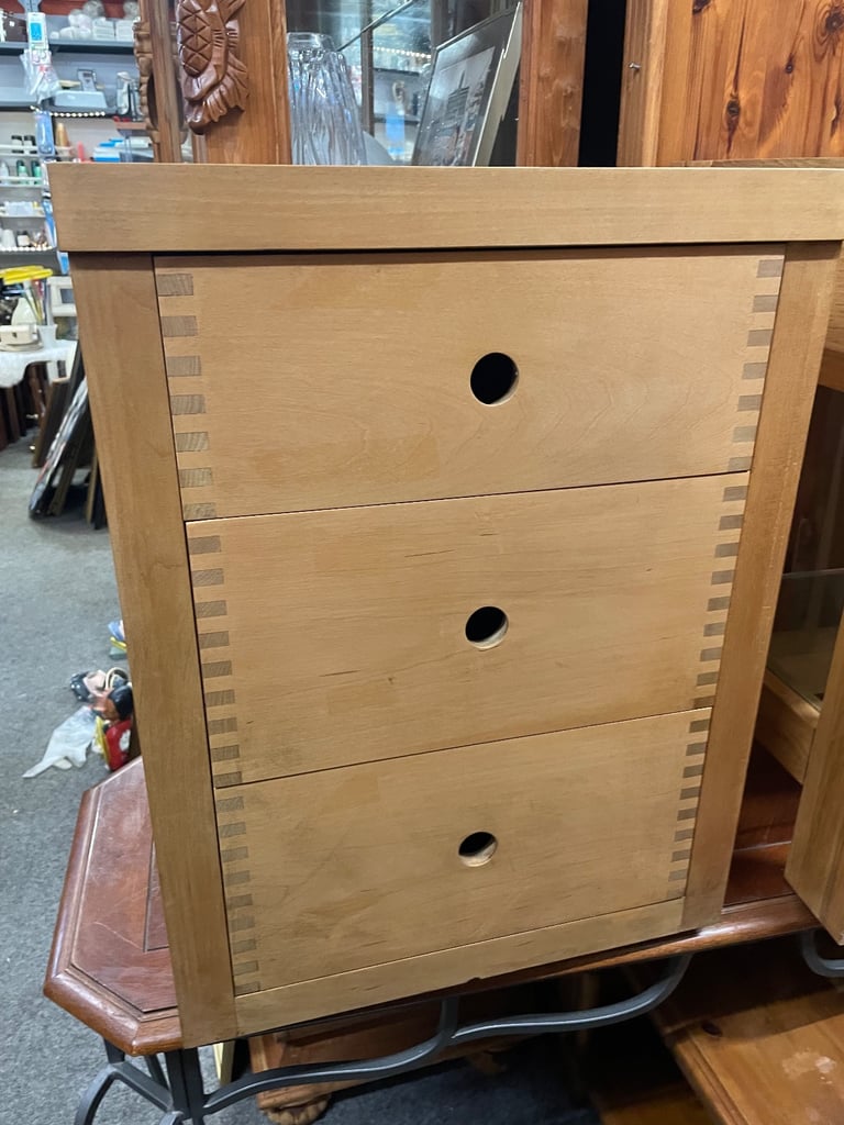 Solid wood, chest of three drawers.