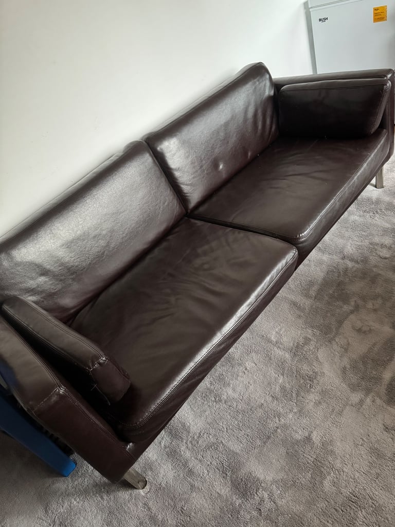 2 Seater leather sofa and puffer table 