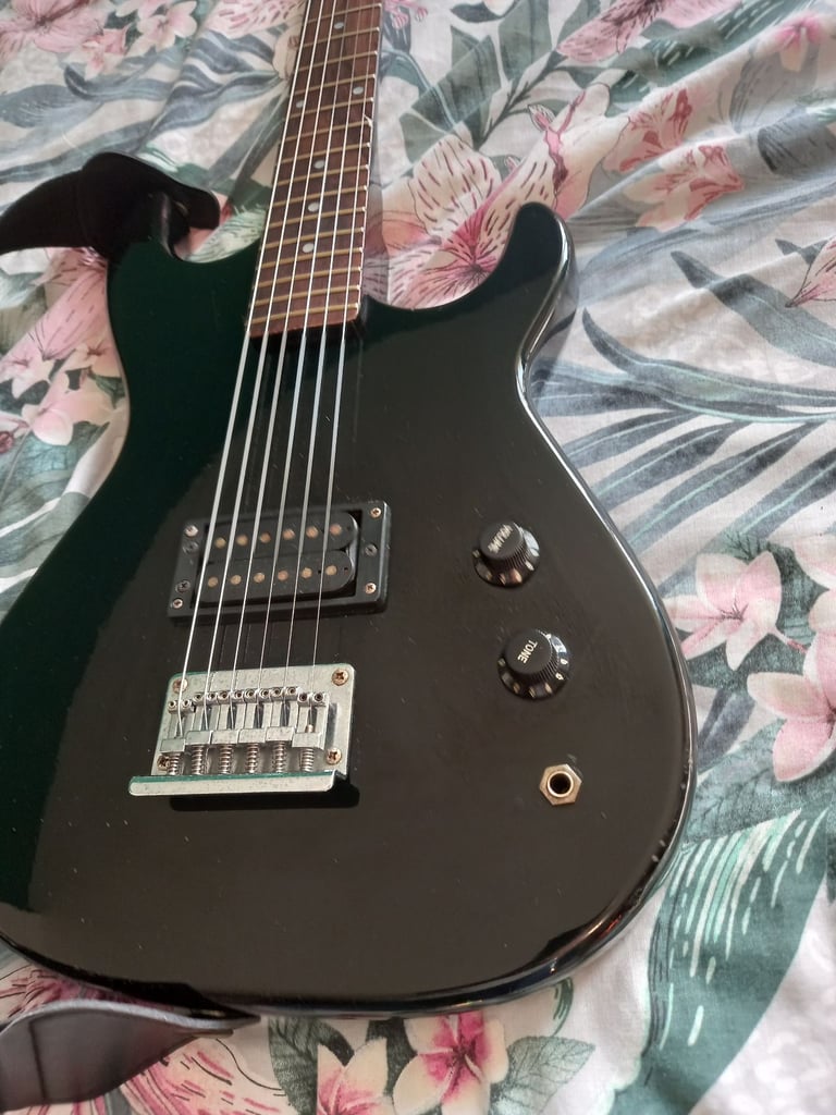 Vintage 1980s Encore single humbucker electric guitar. 