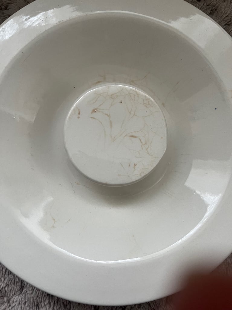 White ceramic jar with lid