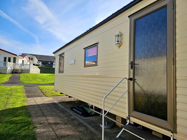 Cheap static caravan for sale at Whitecliff Bay, Isle of Wight PO35 5PL Beach access
