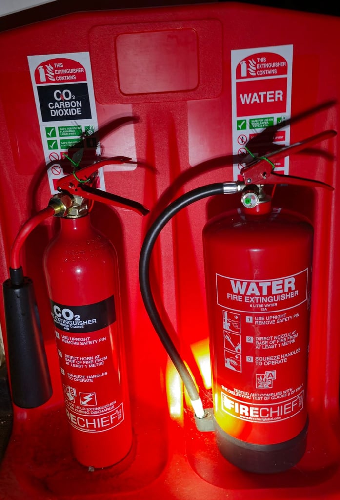 image for Stand with two fire extinguishers