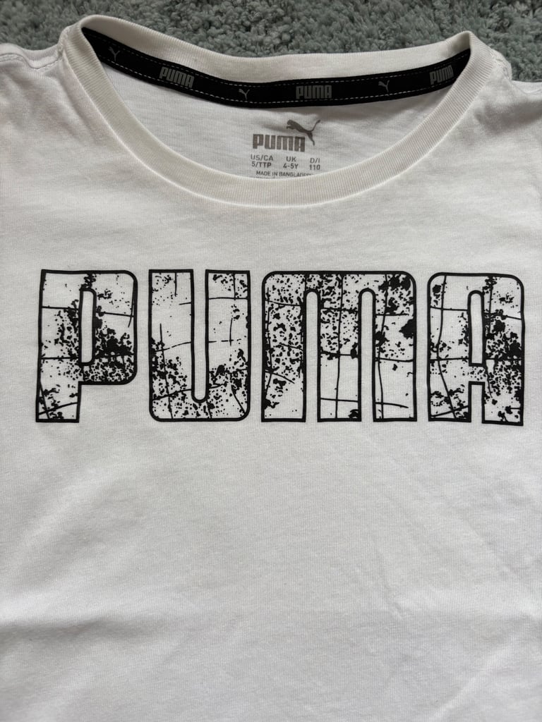 Puma T. Shirt and shorts set age 4-5 I’d say 3-4 yrs