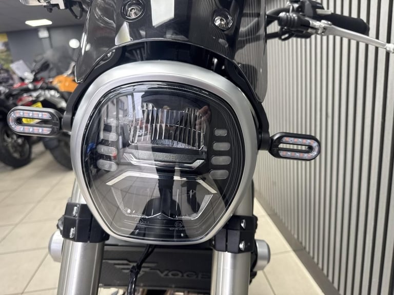 Voge ac525X in grey with yellow decals and only 211 Miles retro adventure