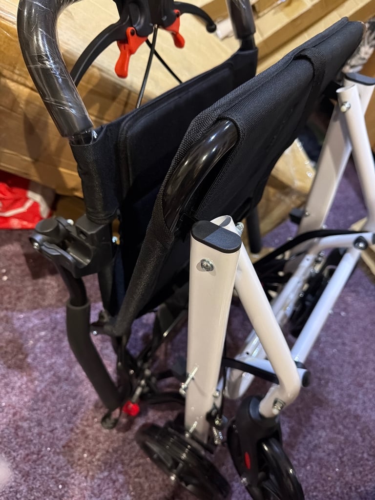 Transport lightweight wheel chair brand new 