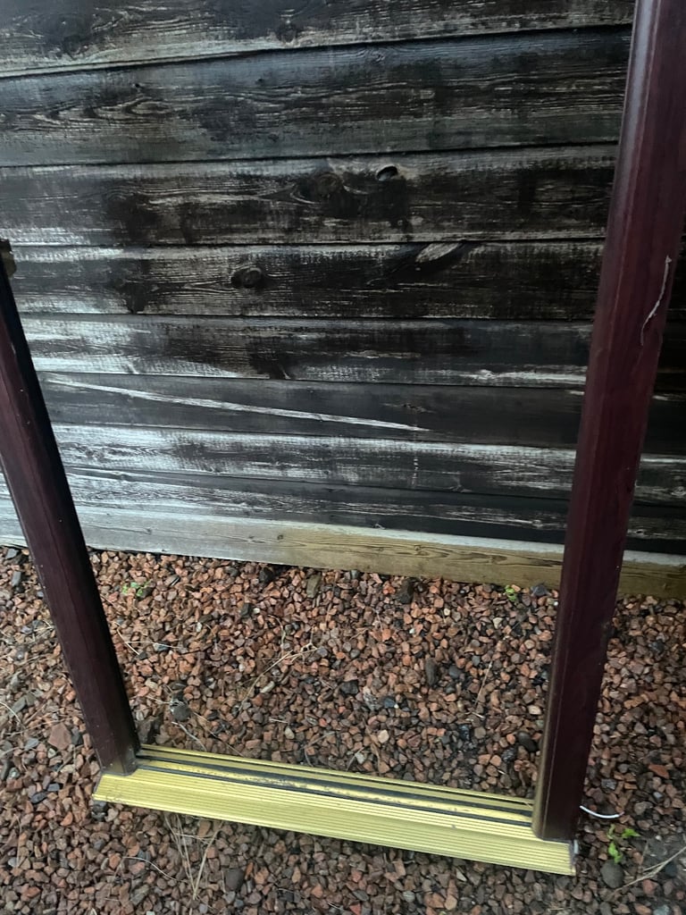 Upvc front door in rosewood 