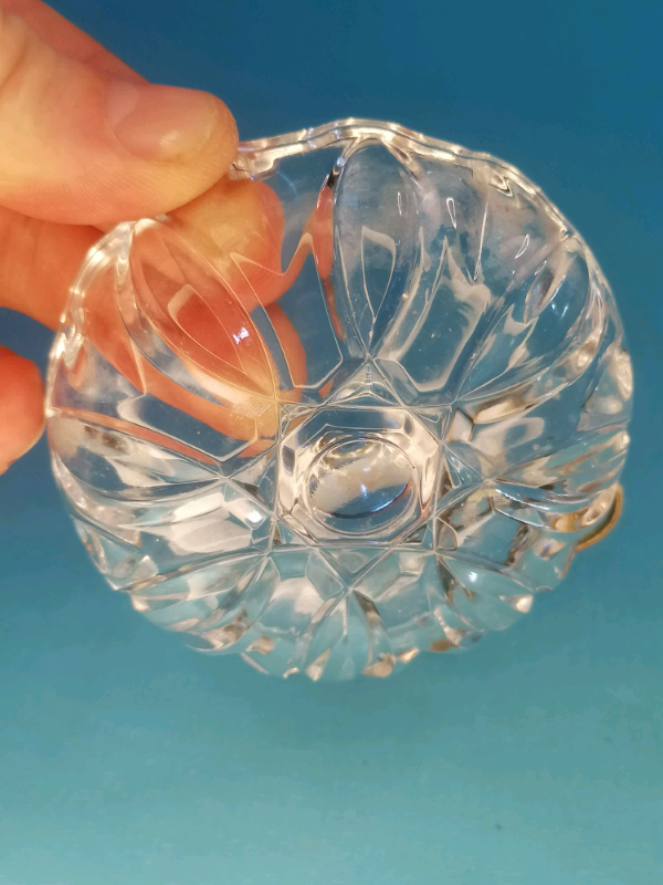 Glass ring holder with butterfly on  a side..