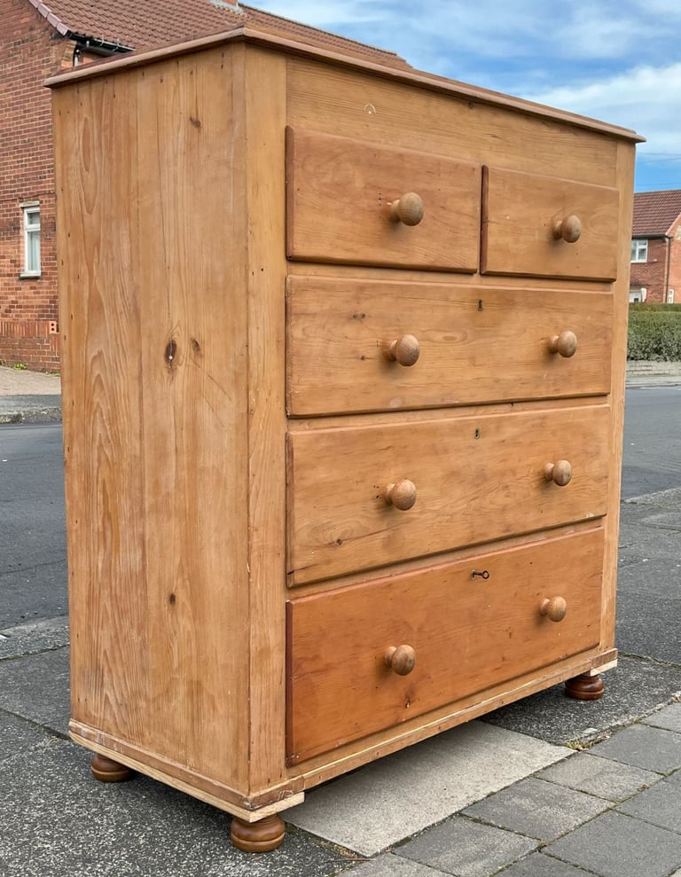 A LARGE VICTORIAN SOLID PINE TALLBOY CHEST OF DRAWERS