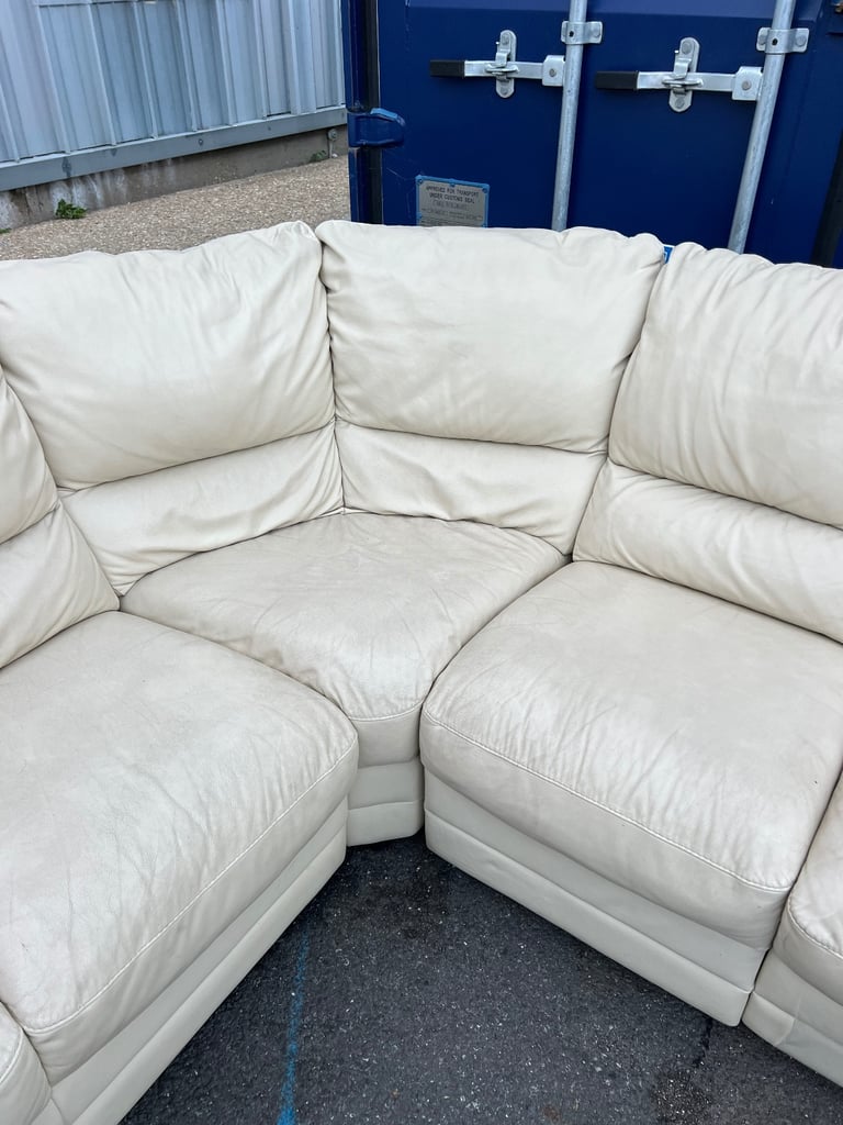 Cream leather corner sofa with recliner 