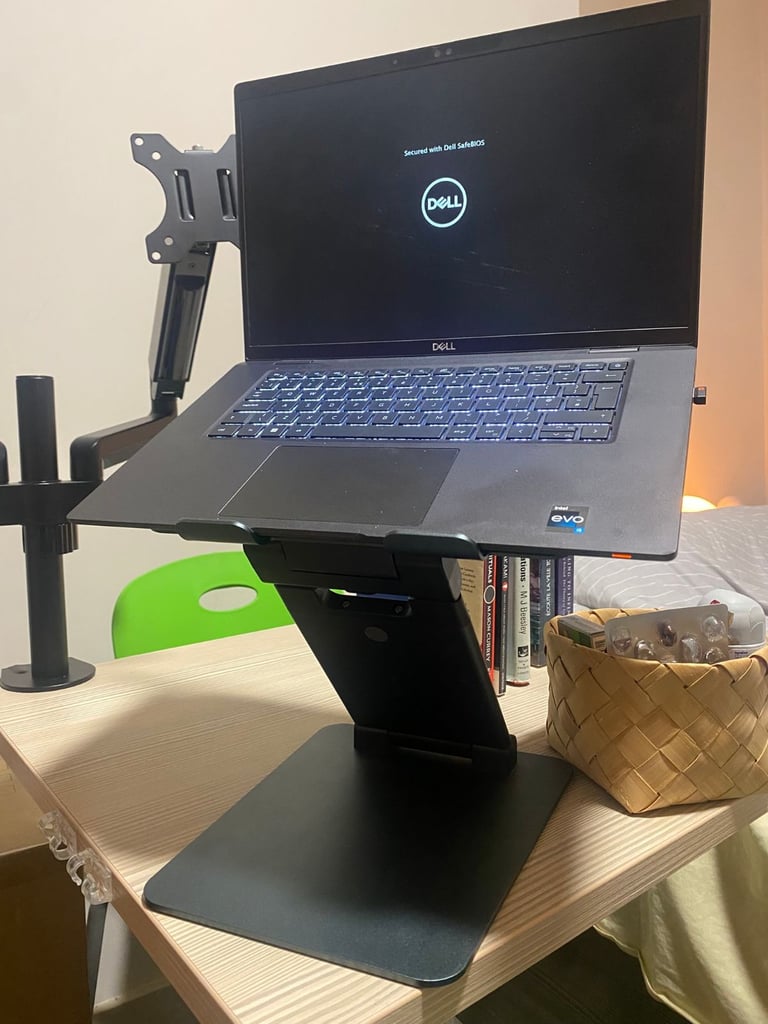 Adjustable metal laptop stand – sturdy, tilting, great condition
