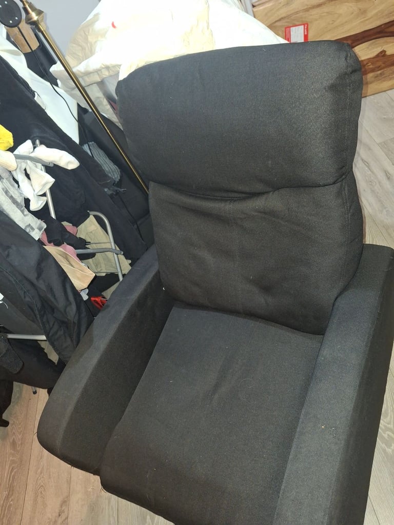 2 black arm chairs, standing up extender for desk and a pink desk with stool.