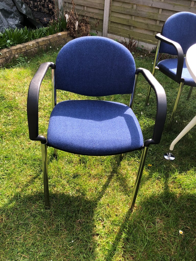 Conference table with 6 blue chairs 