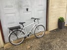 Electric bike hybrid three speed low,medium,fast.colour silver with charging unit and two keys