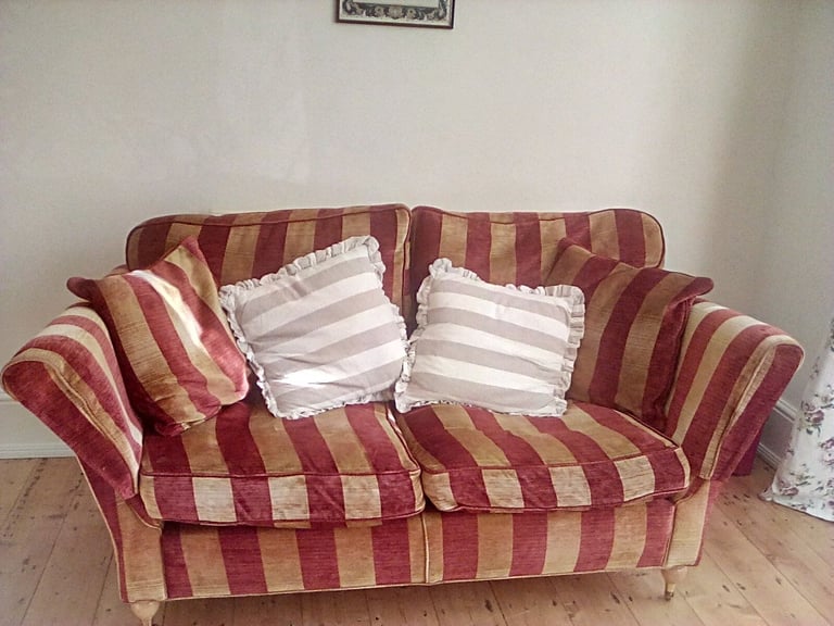 Red and gold striped sofa