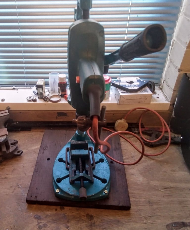 Drill with bench attachment and vice.