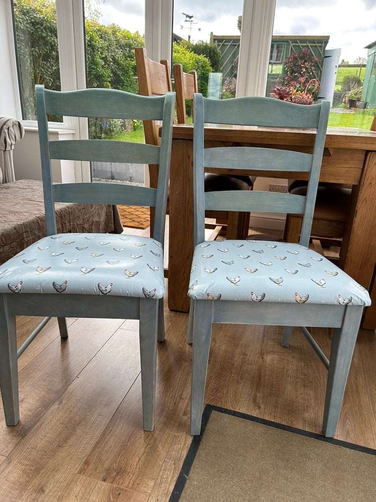 Two up cycled chairs washable seat covers. 