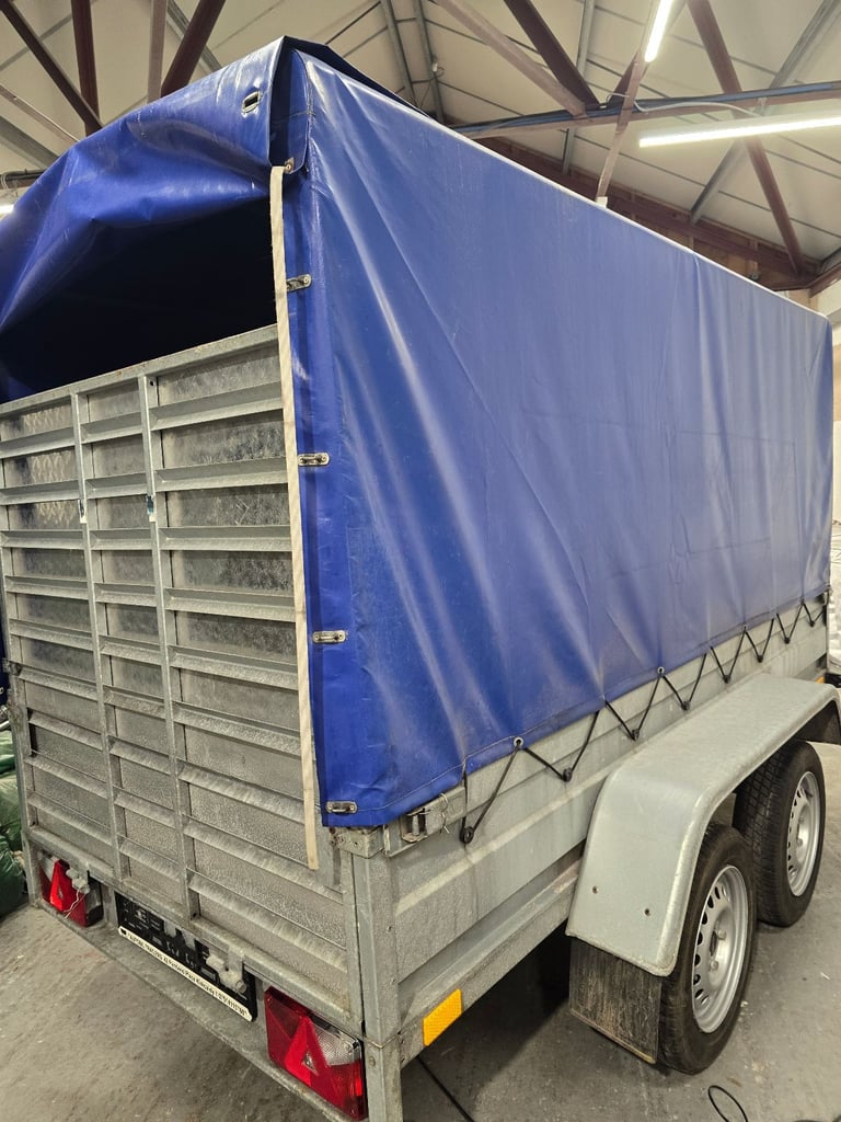 Unbraked 8.7ft by 4.2ft Trailer w/ ramp.