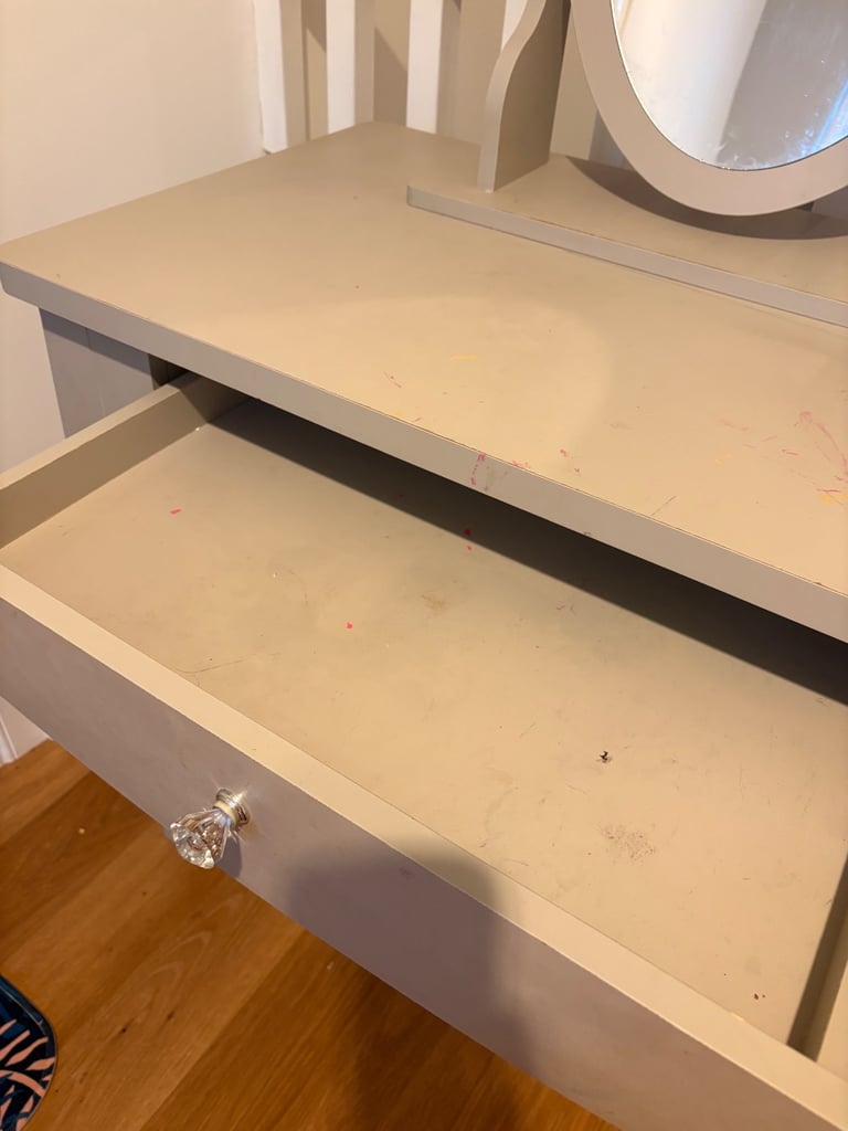 Grey dressing table with attached mirror and one drawer 