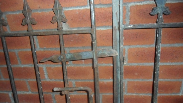 PAIR OF WROUGHT IRON GATES