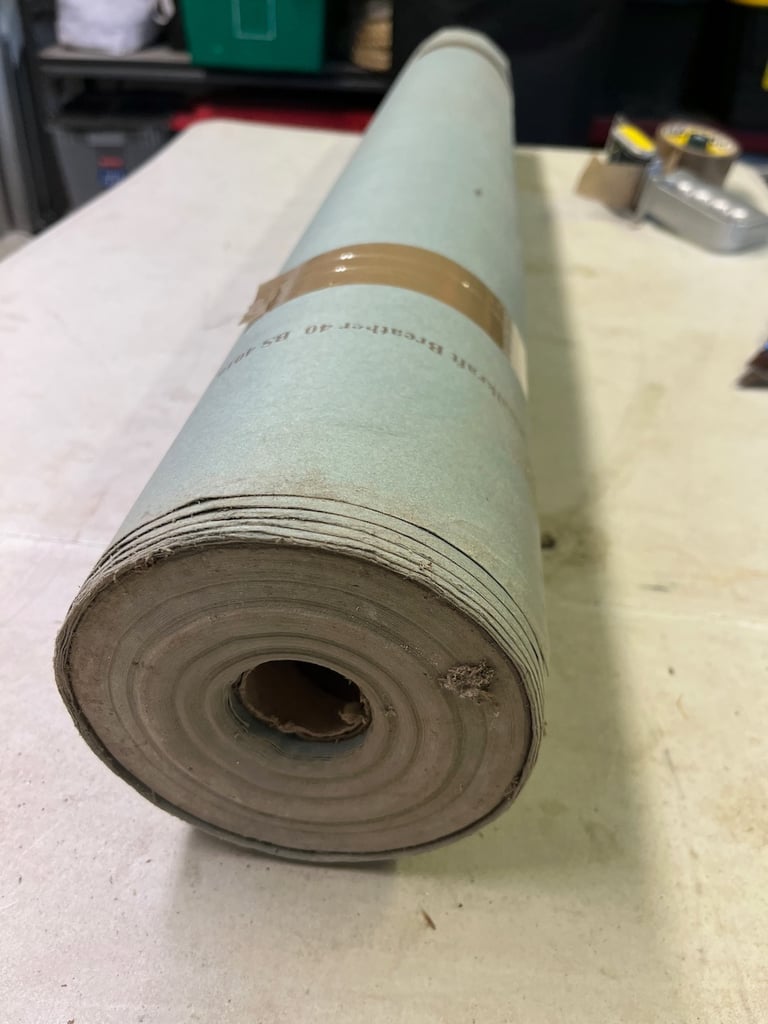Rolls of building paper and vapour barrier