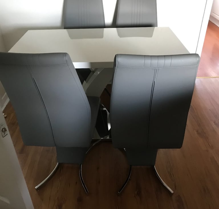 image for Sterling furniture dining table with 4 chairs 