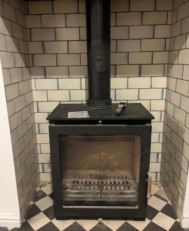 Log Burner and Wooden Beam 