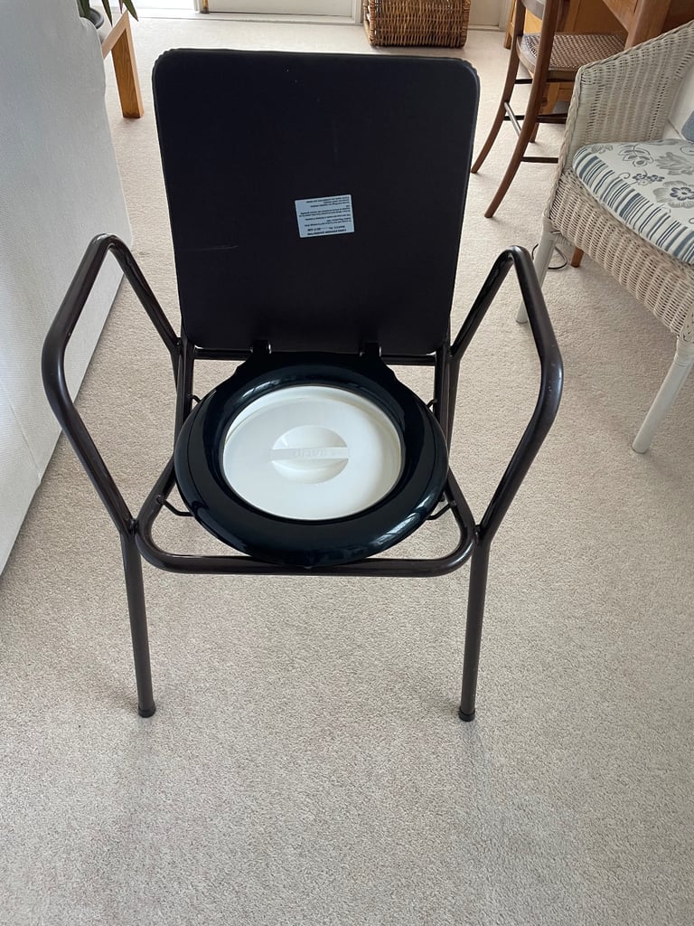 Commode toilet with seat