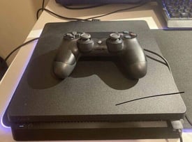 PS4 PlayStation with games and pad 